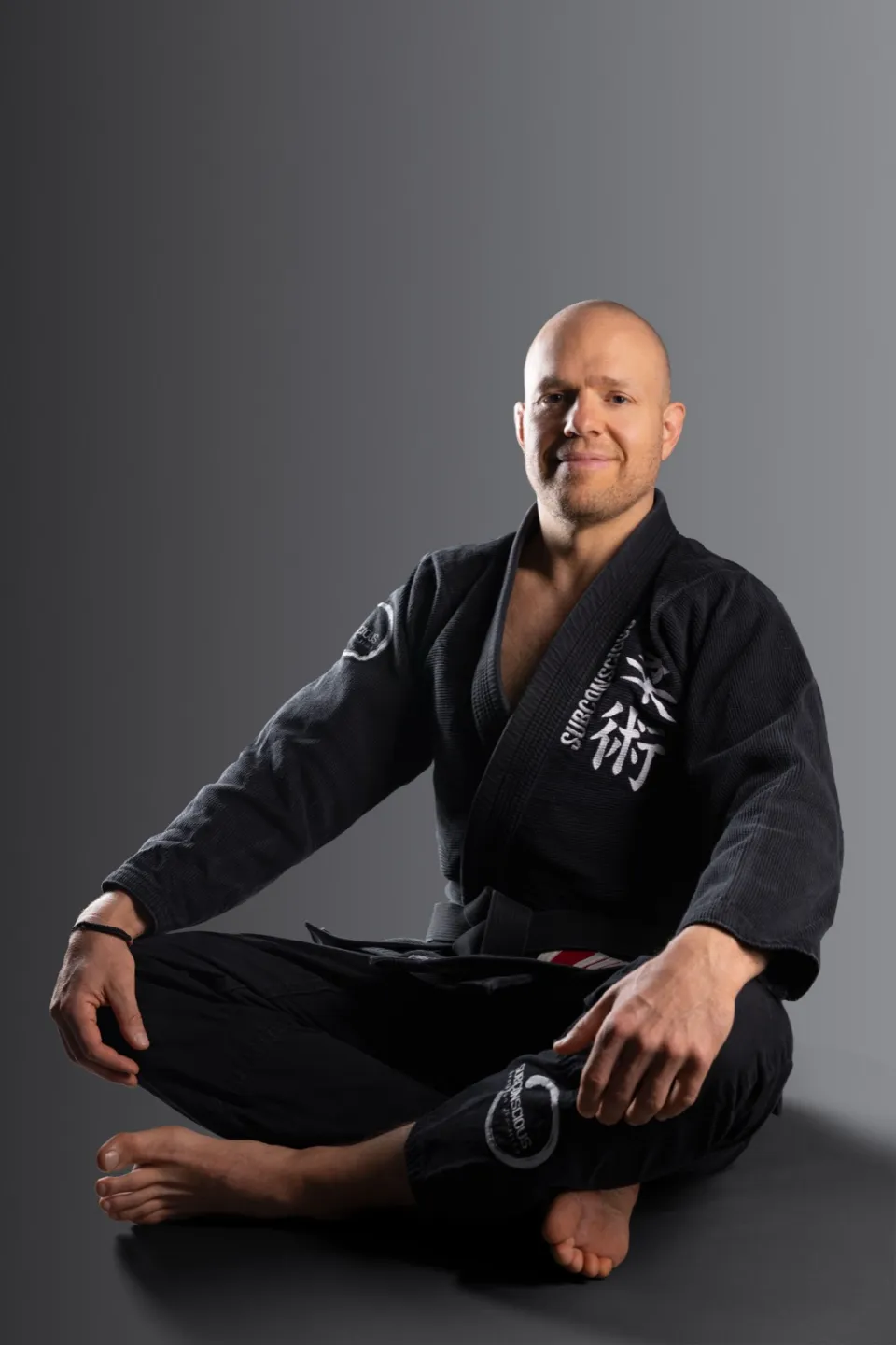 Nic Gregoriades, 4th-degree Brazilian jiu-jitsu black belt
